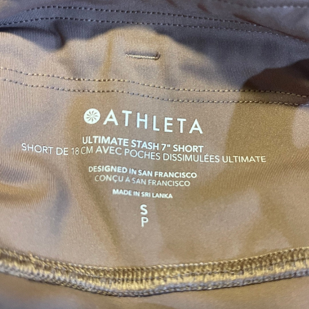 Athleta Ultimate Stash 7" Shorts Size Small High Rise Side Pockets Performance