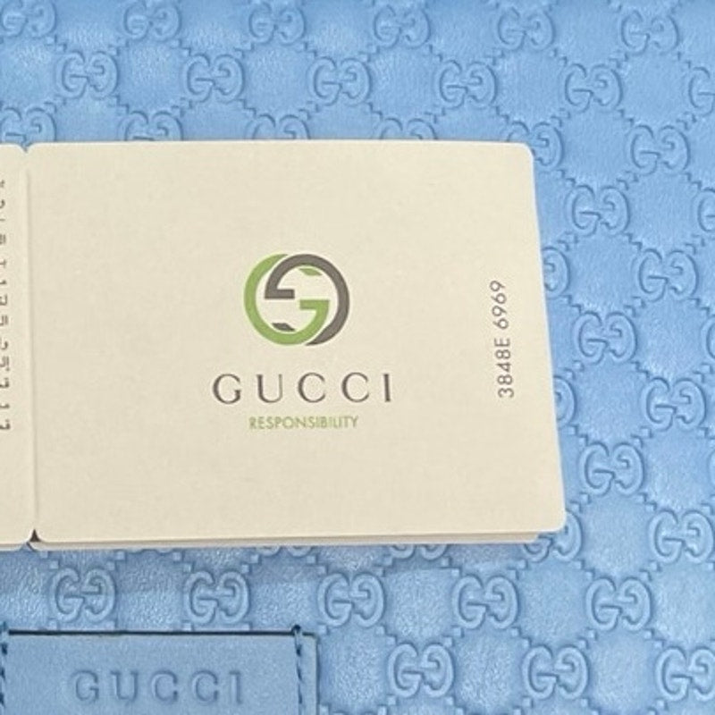 Gucci Blue Micro Guccissima GG Embossed Crossbody Wallet Purse NWT Model #466507