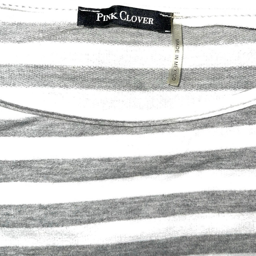 Vintage Pink clover striped blouse w/ a floral design in the back.